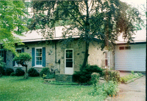 Front view of heritage house located at 1335 West River Road