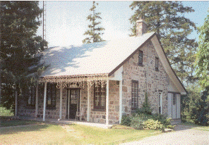 Front and side view of heritage house located at 2517 Fischer Hallman Road.